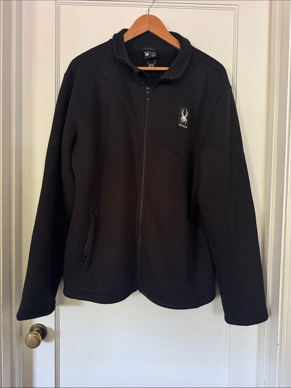 Women's black zip-up fleece jacket